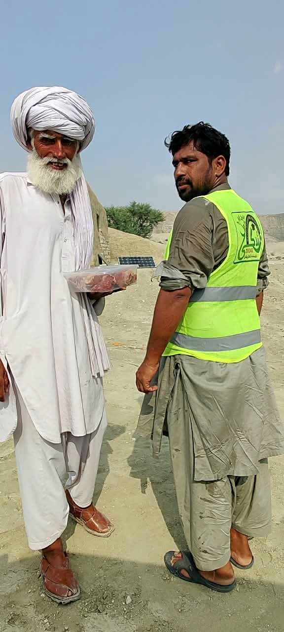 Zindagi volunteer distributing meat